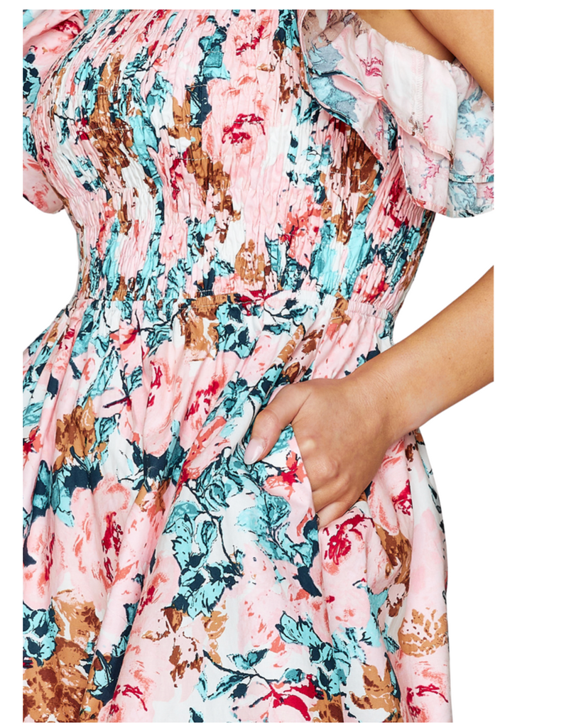 Floral smocked top with ruffle sleeve dress. 