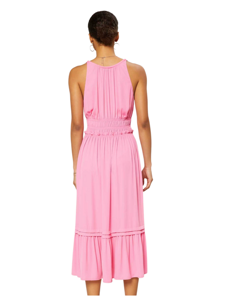 bright candy pink halter style maxi dress with elastic waist and ruffle detail bottom by current air