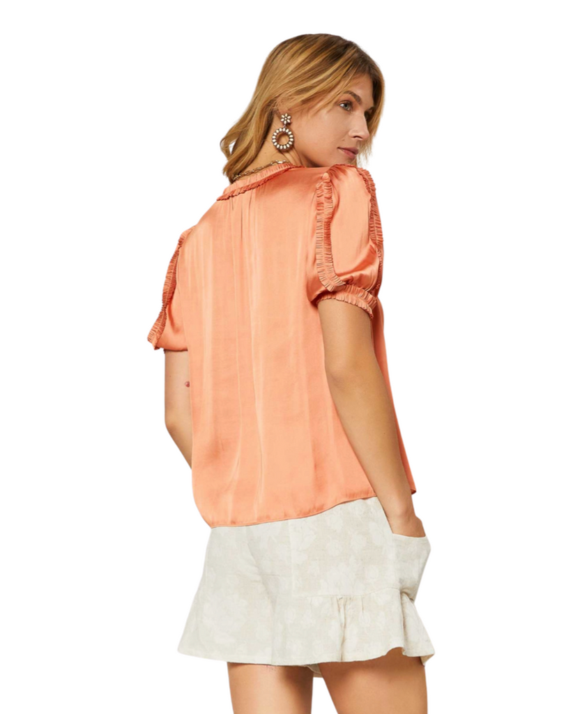 v neck ruffle trim blouse in tangerine by current air