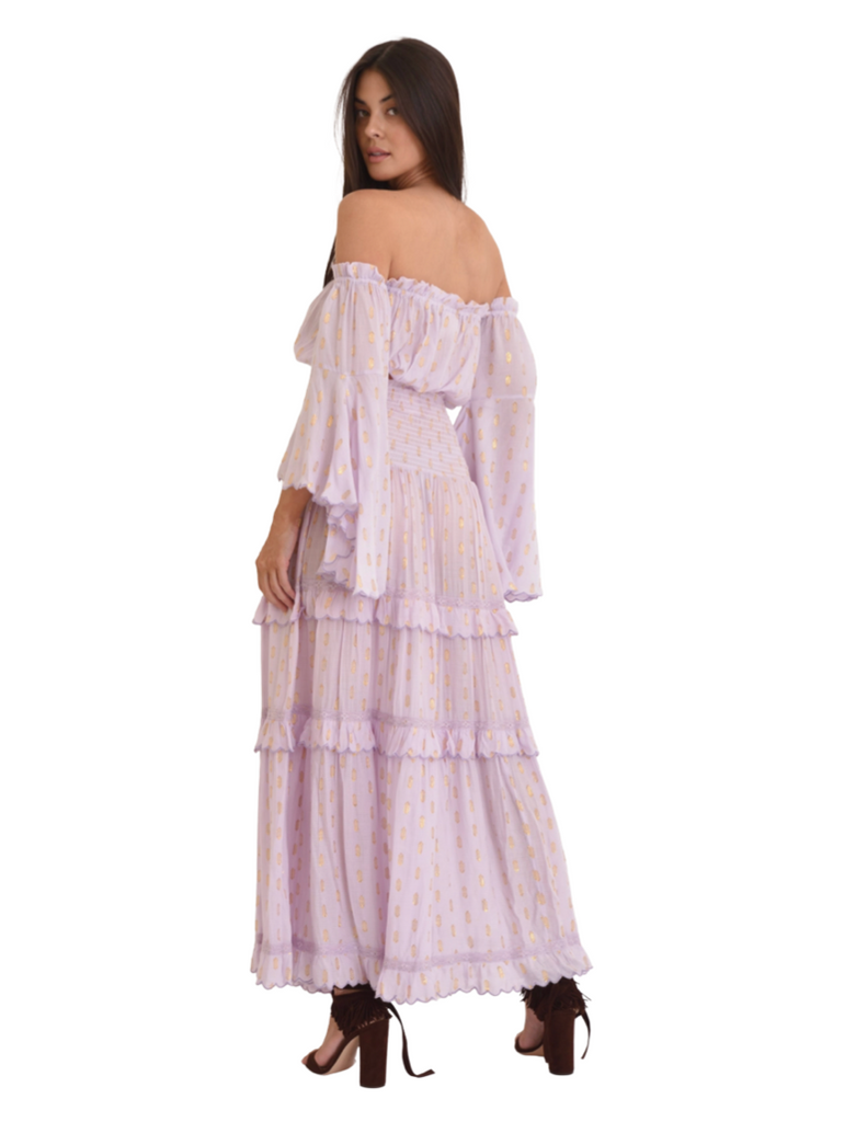 smocked elastic bust and cascading sleeves, with gold details in soft, feminine print