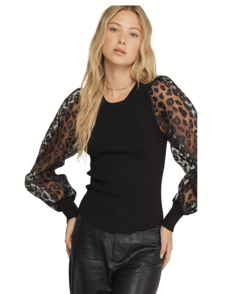 Solid round neck long sleeve ribbed top featuring sheer animal print sleeves
