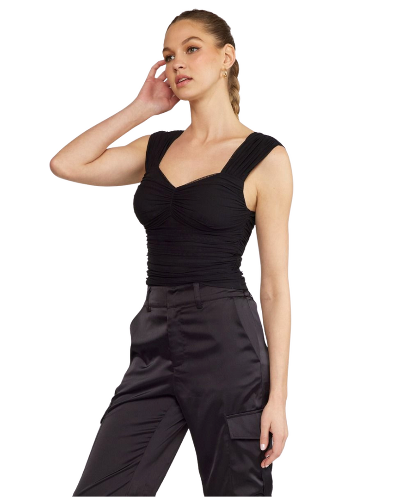 ruched top featuring sweetheart neckline.